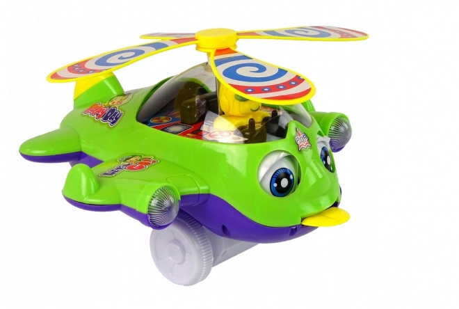 Zielony helikopter pchany z pilotem