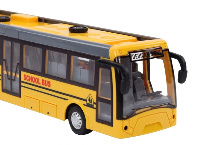Zdalnie sterowany przegubowy autobus szkolny RC 1:32 żółty