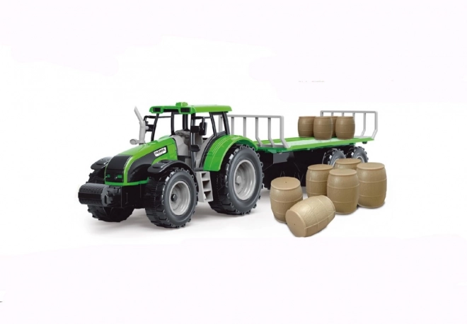 Traktor z mechanizmem bezwładnościowym i przyczepą pełną siana