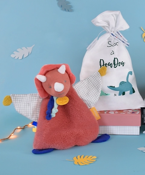 Zestaw podarunkowy Doudou - zabawka z uchwytem na smoczek dinozaur różowy