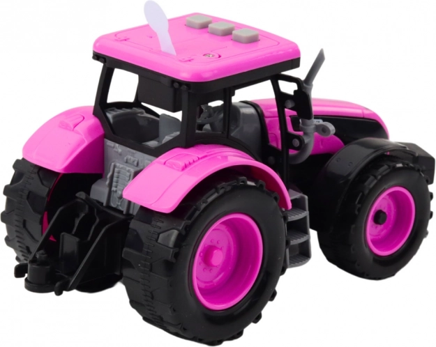 Różowy traktor na baterie z światłami i dźwiękami