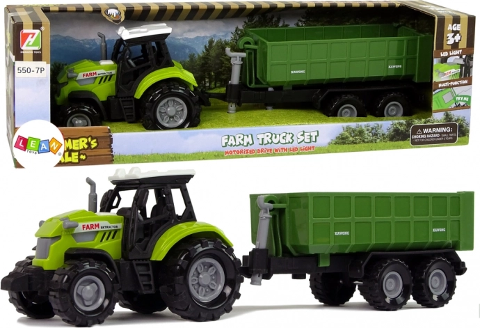 Zielony traktor z odczepianą przyczepą z efektami dźwiękowymi
