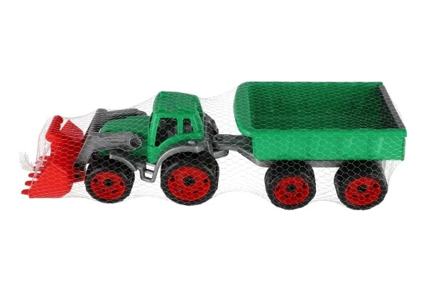 Traktor/ładowarka/koparka z przyczepą z plastikową łyżką na wolnym biegu 2 kolory w siatce 16x61x16cm