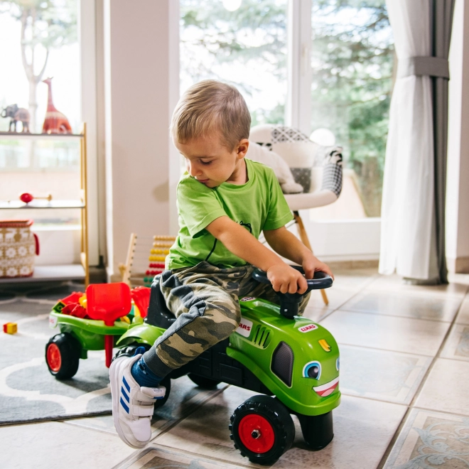 Jeździk traktor Claas zielony z kierownicą i przyczepą