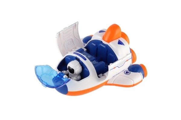 Raketoplan/raketa plastikowa 10x11cm z kosmonautą na napędzany stacjonarnie 2 kolory 12 sztuk w pudełku