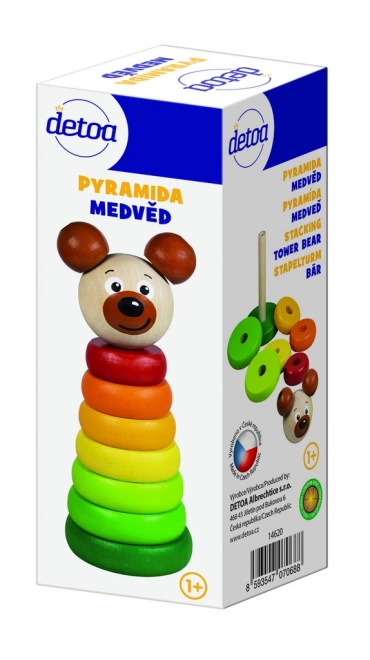 Drewniana piramida z misiem