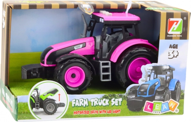 Różowy traktor na baterie z światłami i dźwiękami