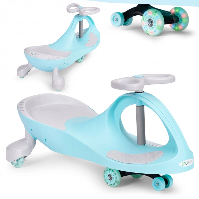 Dziecięcy samochód z świecącymi kołami niebieski Ecotoys