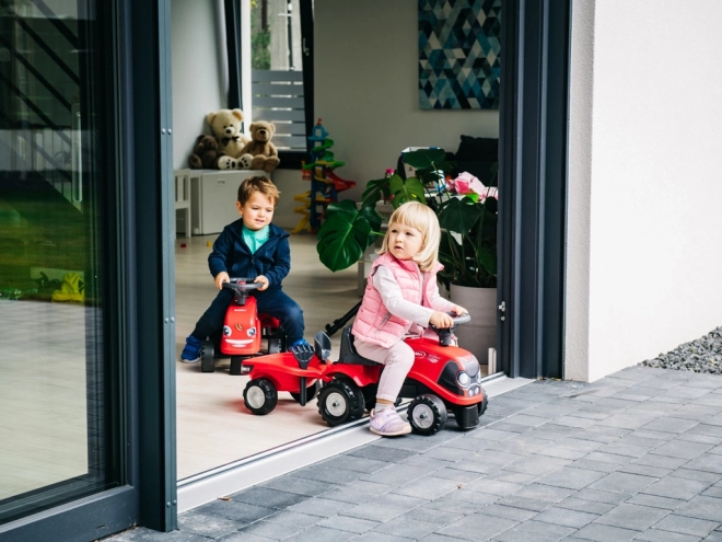 Jeżdżący traktor Baby Case IH czerwony z przyczepą