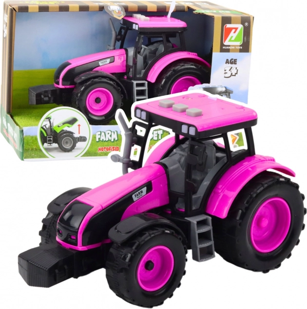 Różowy traktor na baterie z światłami i dźwiękami