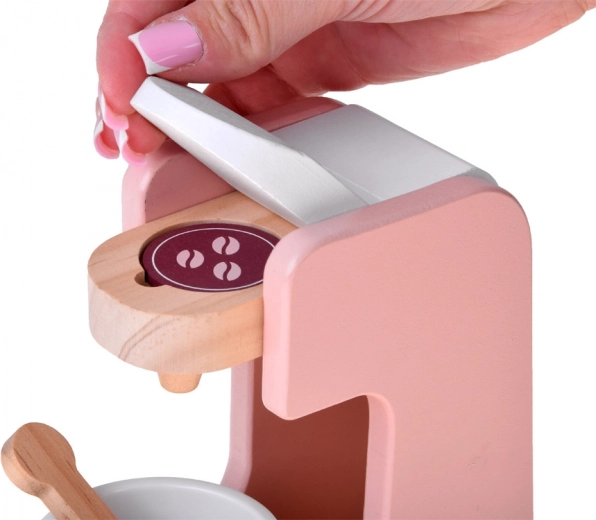 Ekspres kapsułkowy z filiżanką i łyżeczką