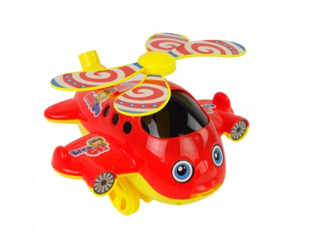 Wesoły zabawkowy helikopter z drążkiem
