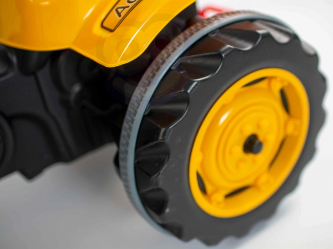 Dziecięcy traktor na pedały z przednią ładowarką