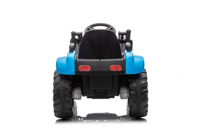 Elektryczny dziecięcy traktor z łyżką niebieski