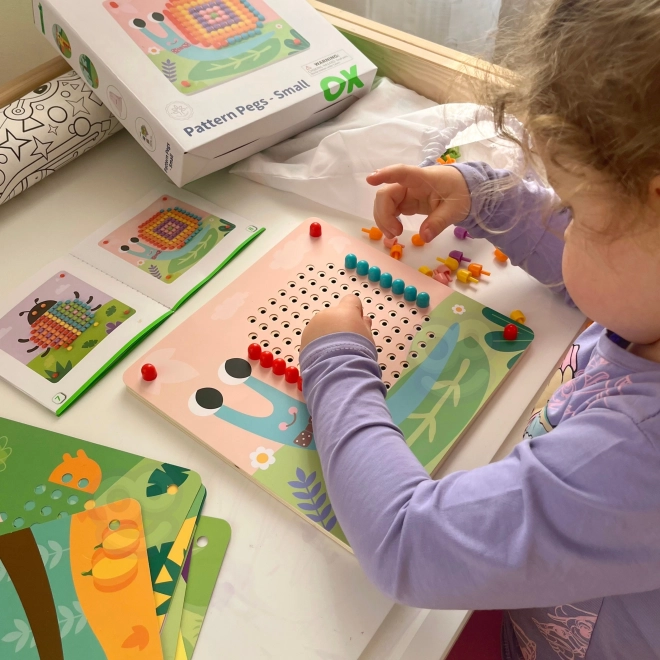 Drewniana układanka z kołeczkami od Tooky Toy