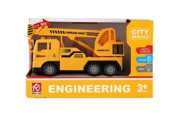 Dźwig zabawkowy plastikowy 16cm z napędem i bateriami z światłem i dźwiękiem w pudełku 21x13x9cm