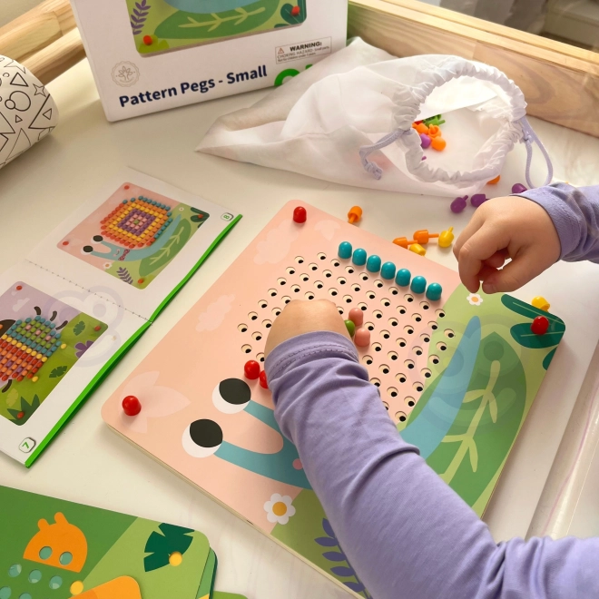 Drewniana układanka z kołeczkami od Tooky Toy
