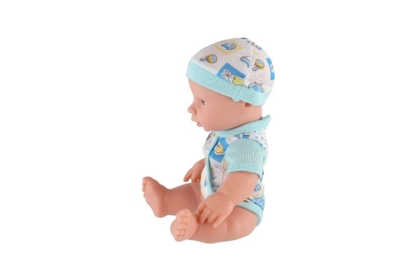 Lalka/miminko solidne ciało plastik 25 cm na baterie z dźwiękiem 3 rodzaje w plastikowej torebce 13x28x7cm