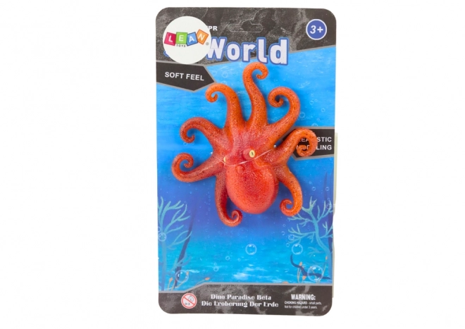 Gumowa figurka pomarańczowej ośmiornicy Sea World