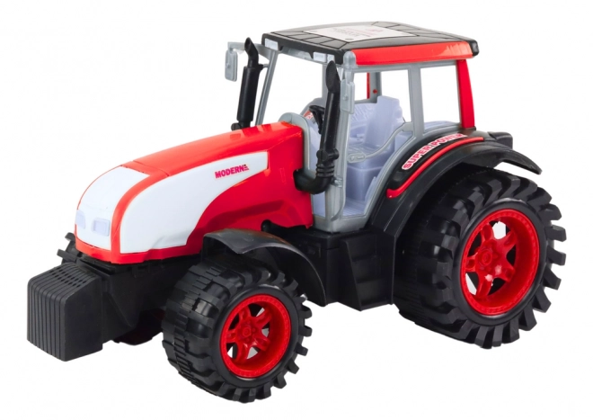Duży rolniczy traktor z napędem Czerwony