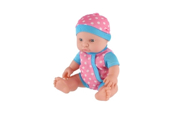 Lalka/miminko solidne ciało plastik 25 cm na baterie z dźwiękiem 3 rodzaje w plastikowej torebce 13x28x7cm