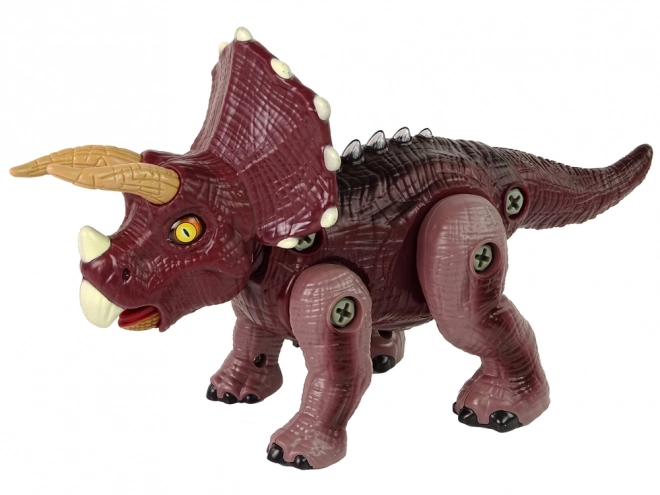Plastowy dinozaur do skręcania z wiertarką