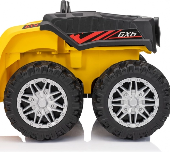 Żółty sportowy dziecięcy quad TX ATV