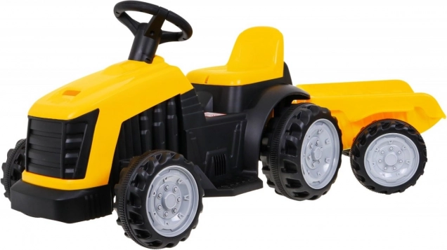 Dziecięcy traktor na pedały z przyczepą – żółty