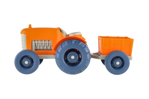 Plastikowy traktor z przyczepą 31 cm