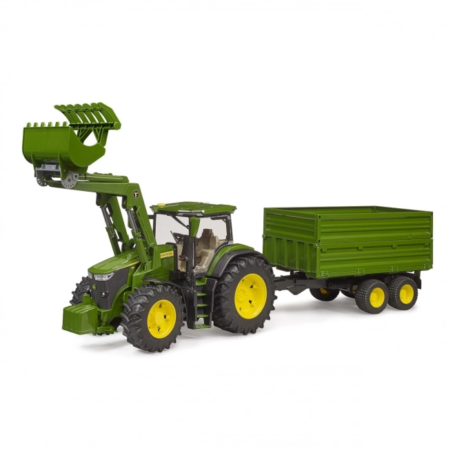 Traktor John Deere 7R z ładowaczem czołowym i przyczepą