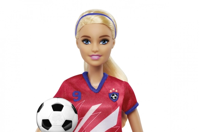 Lalka Barbie piłkarka w czerwonym stroju