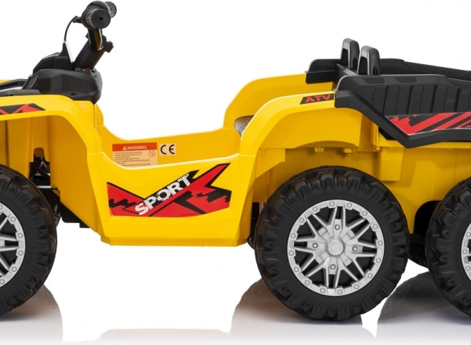 Żółty sportowy dziecięcy quad TX ATV
