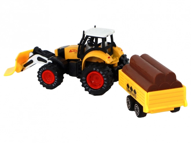 Traktor z przyczepą żółto-czerwony