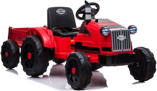 Elektryczny traktor z przyczepą czerwony