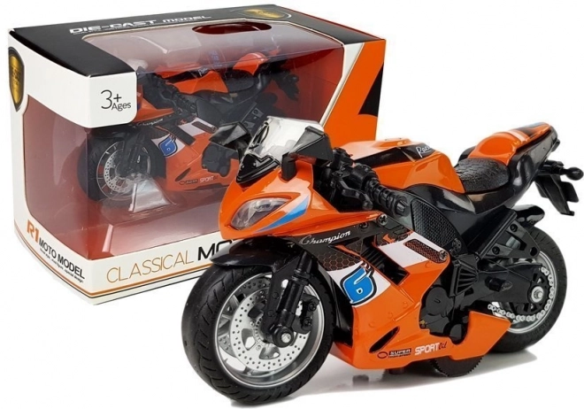 Pomarańczowa zabawka motocykl z napędem