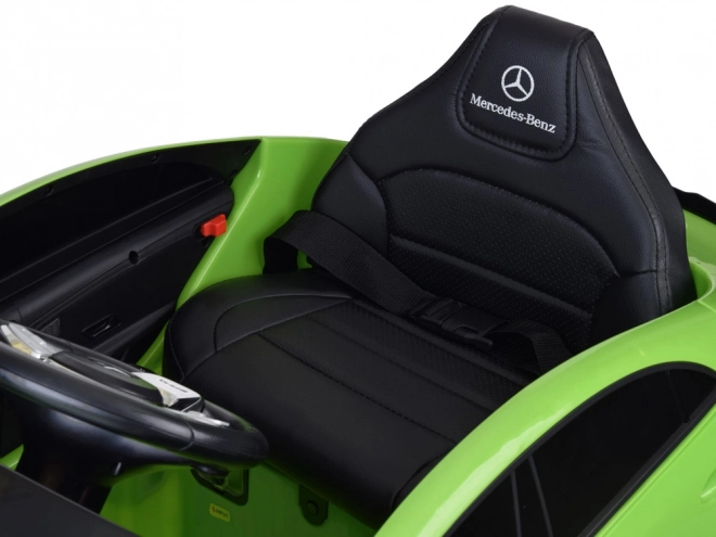 Dziecięcy samochód elektryczny Mercedes AMG CLA 45s z efektem bujania – Zielona