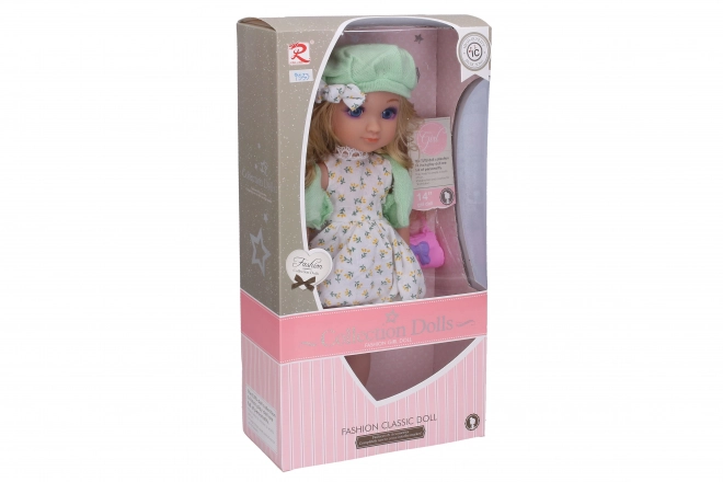 Lalka z torebką, czapką i efektami dźwiękowymi 36 cm