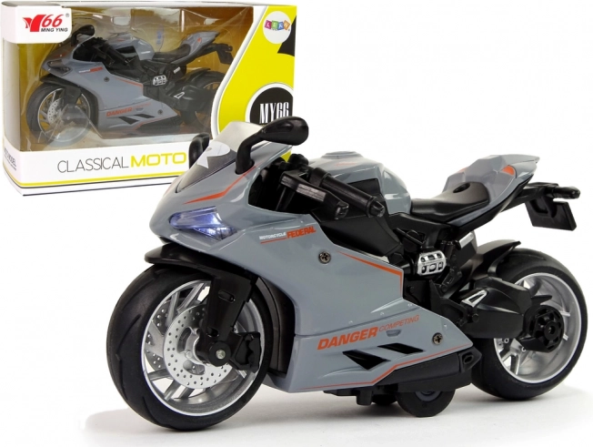 Motocykl sportowy model 1:12 z napędem pull-back, dźwiękiem i światłami