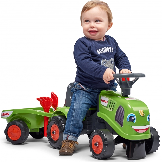 Jeździk traktor Claas zielony z kierownicą i przyczepą