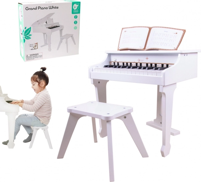 Dziecięce białe pianino z ławeczką i książeczką nut CLASSIC WORLD