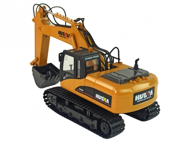 Żółty RC koparka Caterpillar 1:14 na zdalne sterowanie