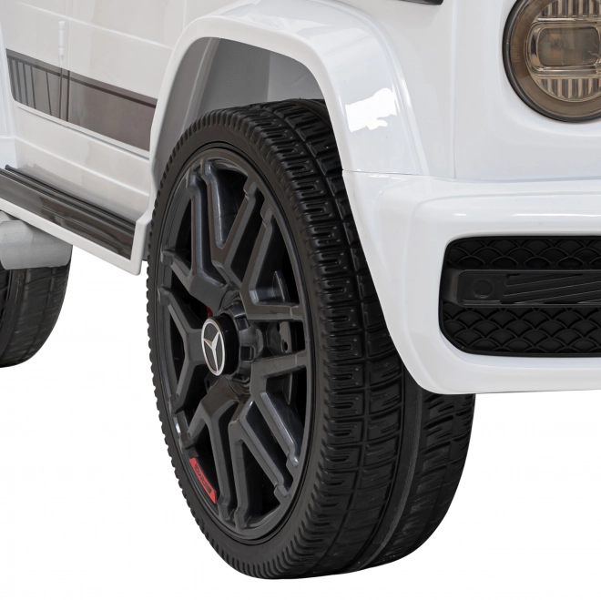 Mercedes AMG G63 dla dzieci biały + zdalne sterowanie + MP3 LED + wolny start + EVA + pasy