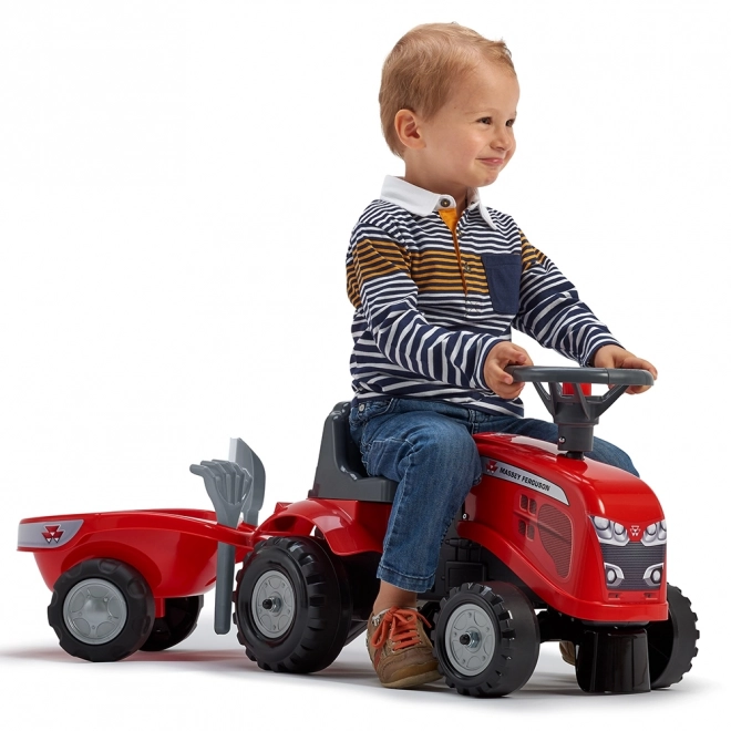 Odpychacz traktor Massey Ferguson czerwony z kierownicą i wa