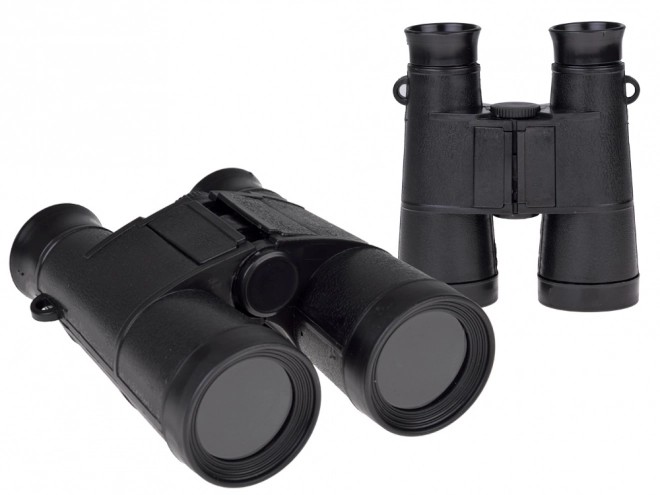 Zestaw sprzętu wojskowego z hełmem, lornetką i walkie-talkie