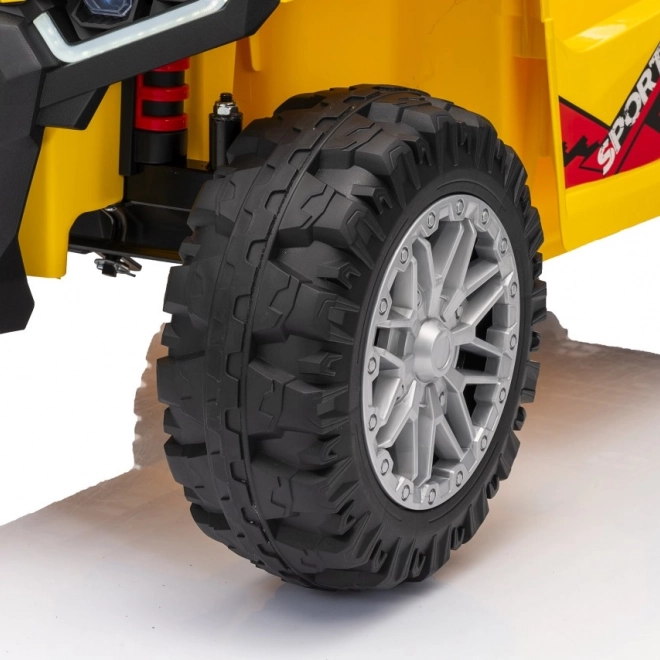 Żółty sportowy dziecięcy quad TX ATV