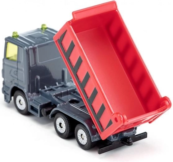 Dwie wywrotki z otwieranymi burtami