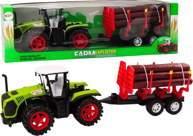 Zielony rolniczy traktor z przyczepą do przewozu kłód