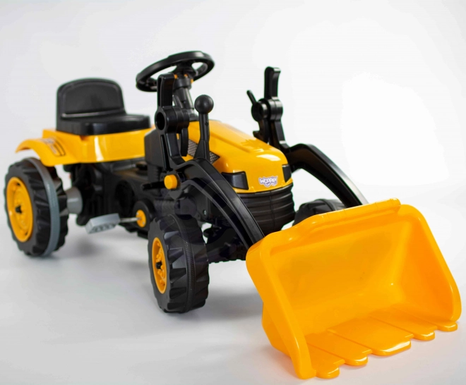 Dziecięcy traktor na pedały z przednią ładowarką