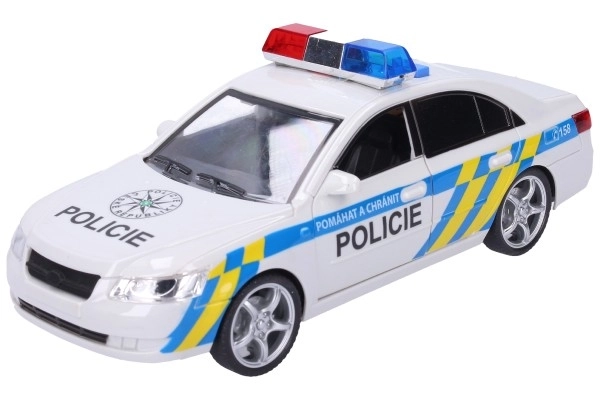 Samochód policyjny plastikowy 24 cm na baterie z dźwiękiem i światłem w pudełku 28x14,5x12 cm