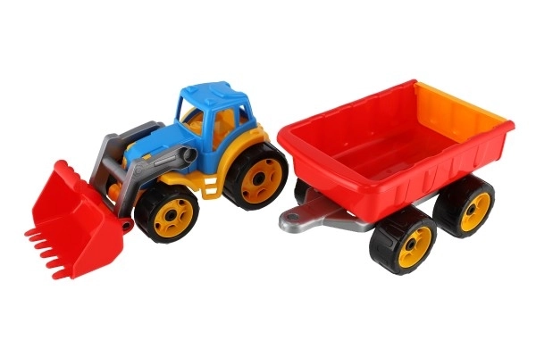 Traktor/ładowarka/koparka z przyczepą z plastikową łyżką na wolnym biegu 2 kolory w siatce 16x61x16cm